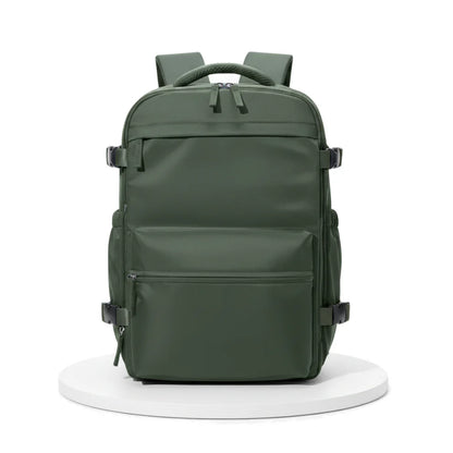 Green backpack on a white background